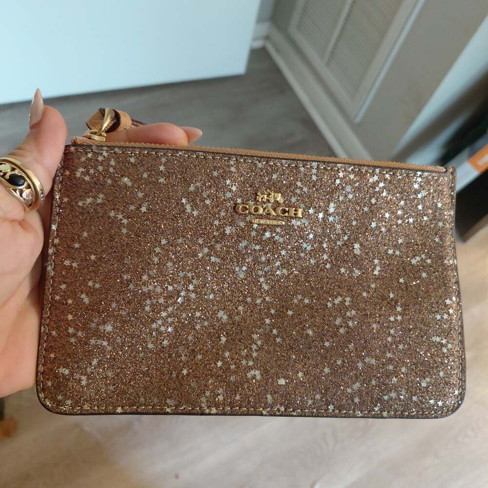 gold glitter Coach wristlet purse